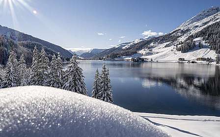 Snow-covered mountain lake