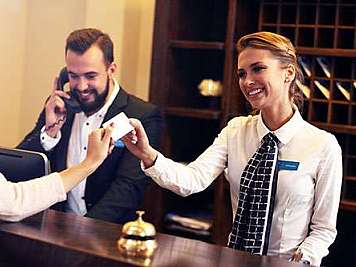 Hotel reception with staff